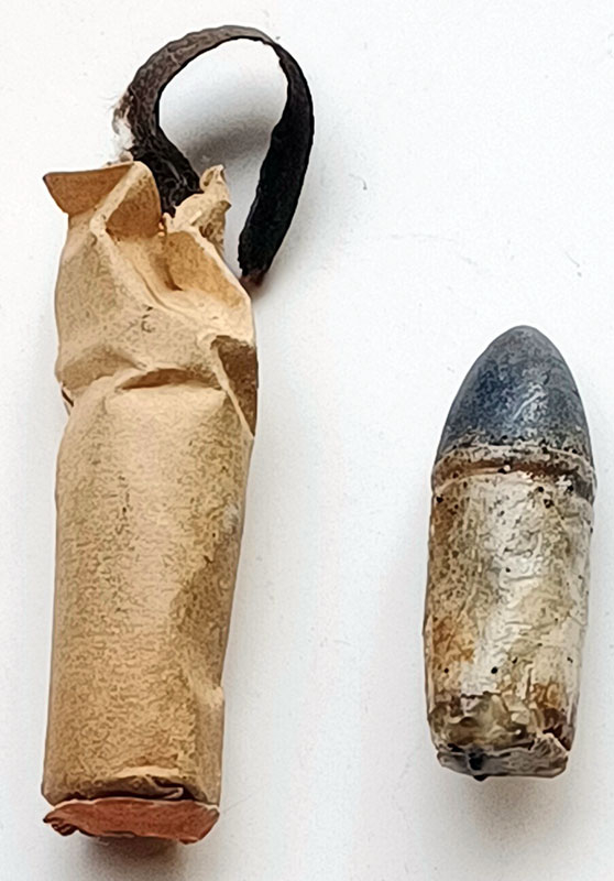110 BORE (~.31 CALIBER) REVOLVER CARTRIDGE IN ENVELOPE
