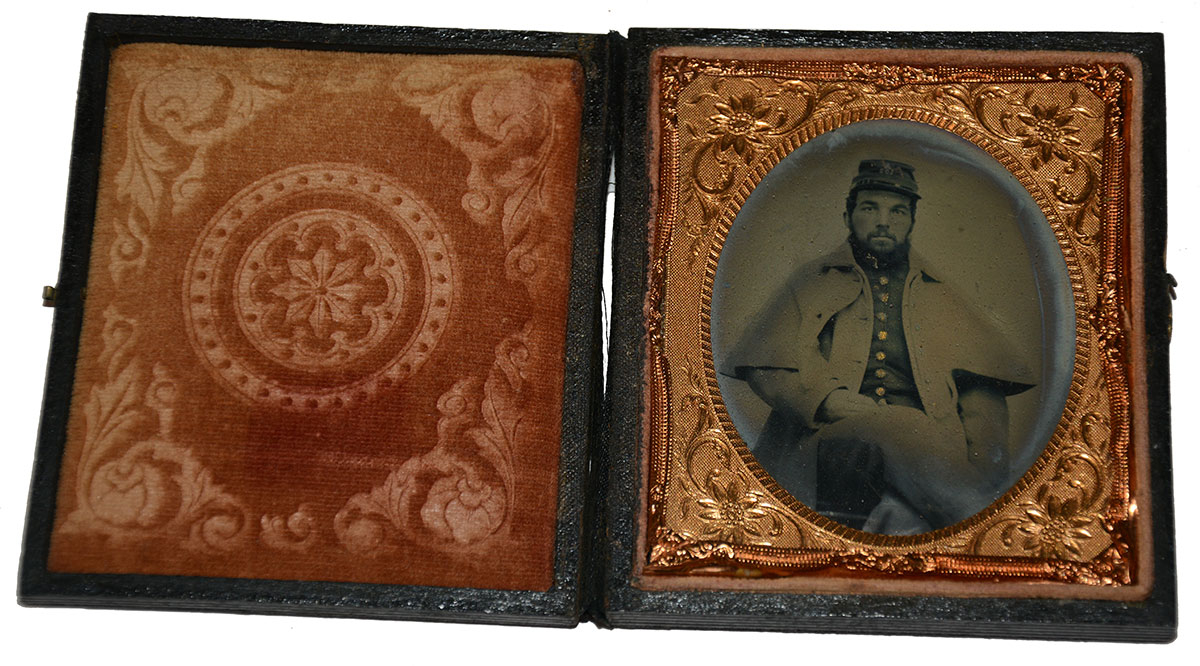 SIXTH-PLATE AMBROTYPE OF SEATED UNION SOLDIER FROM THE 100TH REGIMENT