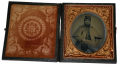 SIXTH-PLATE AMBROTYPE OF SEATED UNION SOLDIER FROM THE 100TH REGIMENT