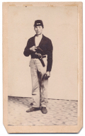 FULL STANDING VIEW OF UNION SOLDIER HOLDING A POCKET REVOLVER