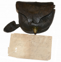 EARLY BATTLEFIELD PICK-UP PERCUSSION CAP POUCH WITH OLD NOTE