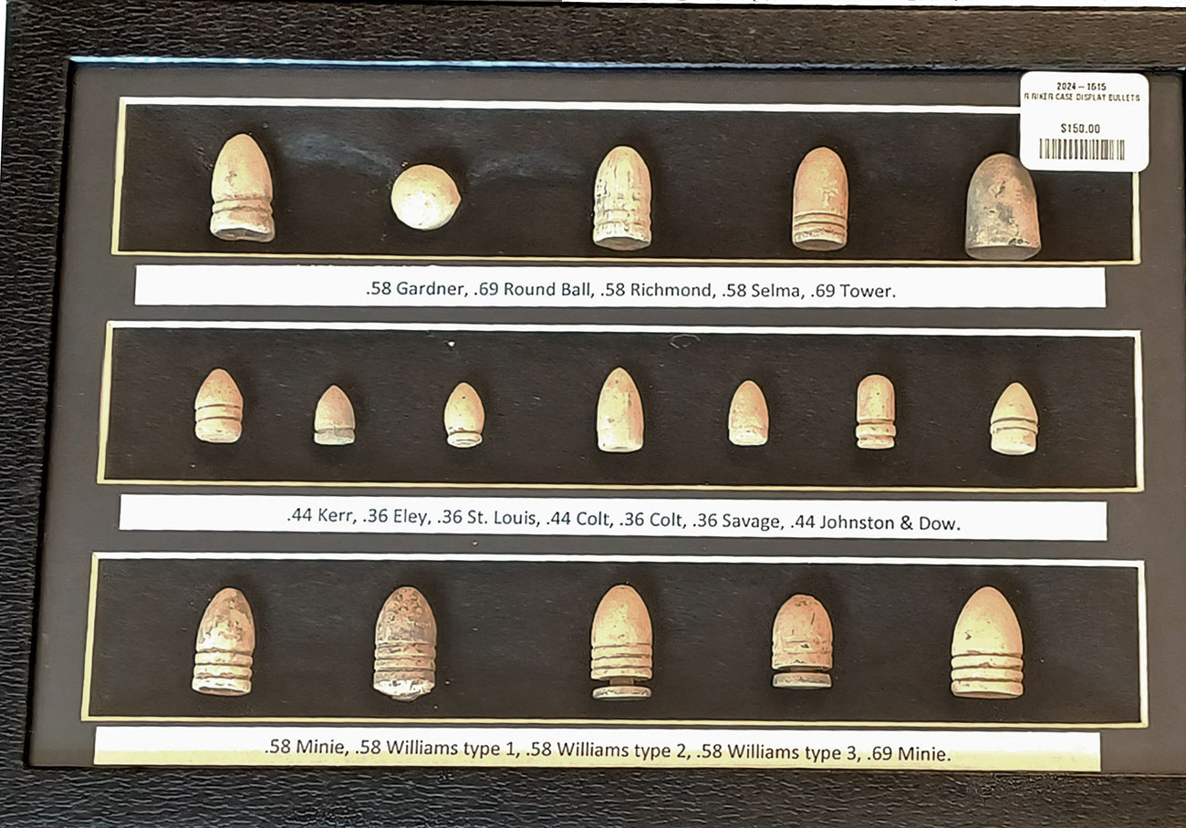 DISPLAY OF MUSKET AND REVOLVER BULLETS