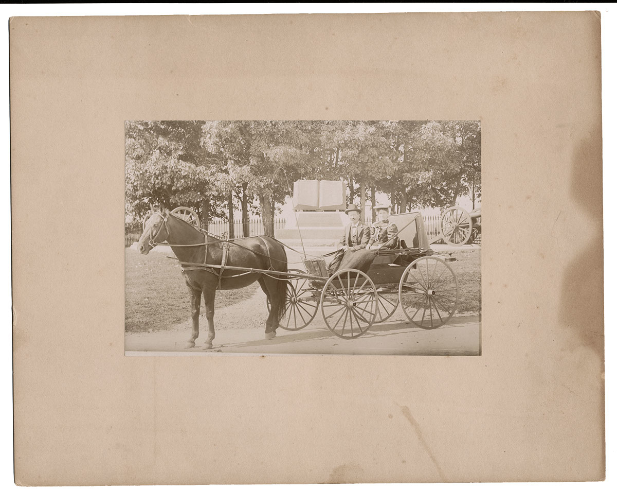 ALBUMEN PHOTO BY MUMPER OF TOURISTS IN CARRIAGE IN FRONT OF HIGH WATER MARK MEMORIAL