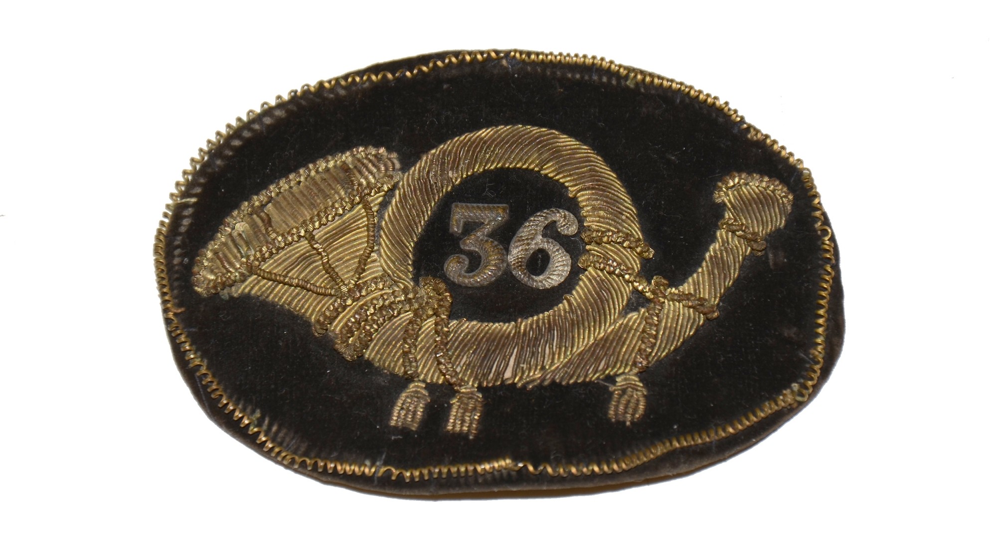 ITEM FROM A GROUPING OF PERSONAL EFFECTS IDENTIFIED TO MAJOR JAMES A. RANEY, 36TH NEW YORK INFANTRY - INFANTRY HAT INSIGNIA
