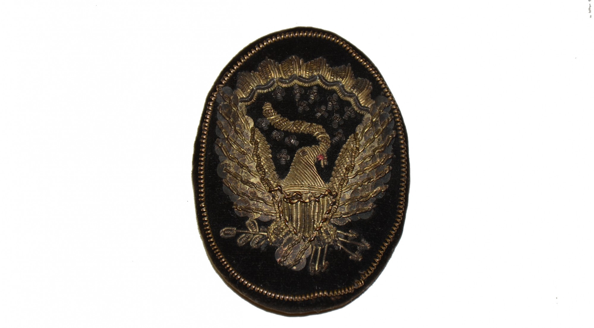 ITEM FROM A GROUPING OF PERSONAL EFFECTS IDENTIFIED TO MAJOR JAMES A. RANEY, 36TH NEW YORK INFANTRY - HARDEE HAT INSIGNIA