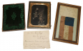 IMPRESSIVE HALF-PLATE TINTYPE OF CONFEDERATE BROTHERS WILLIAM AND RUFUS BEARDEN IN GEORGIA UNIFORMS WITH PRESENTATION TO THEIR SISTER AND WILLIAM’S SMALL C.S. FIRST NATIONAL FLAG WITH BLOODSTAINS FROM FIRST MANASSAS