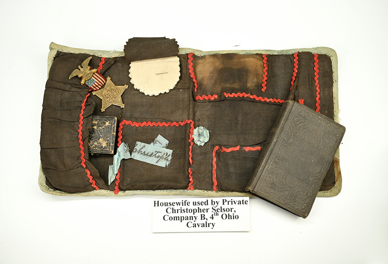 SEWING KIT AND NEW TESTAMENT OF CHRISTOPHER SELSOR 4th OHIO CAVALRY WITH A TINTYPE OF THE GIRL WHO GAVE THEM TO HIM (?) AND HIS G.A.R. BADGE