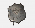 SILVER SHIELD-SHAPED ID BADGE – 89TH NEW YORK; ELI M. RUGGLES