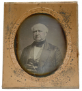 ½(HALF) PLATE DAGUERREOTYPE OF OLDER MAN, IN BRASS MAT