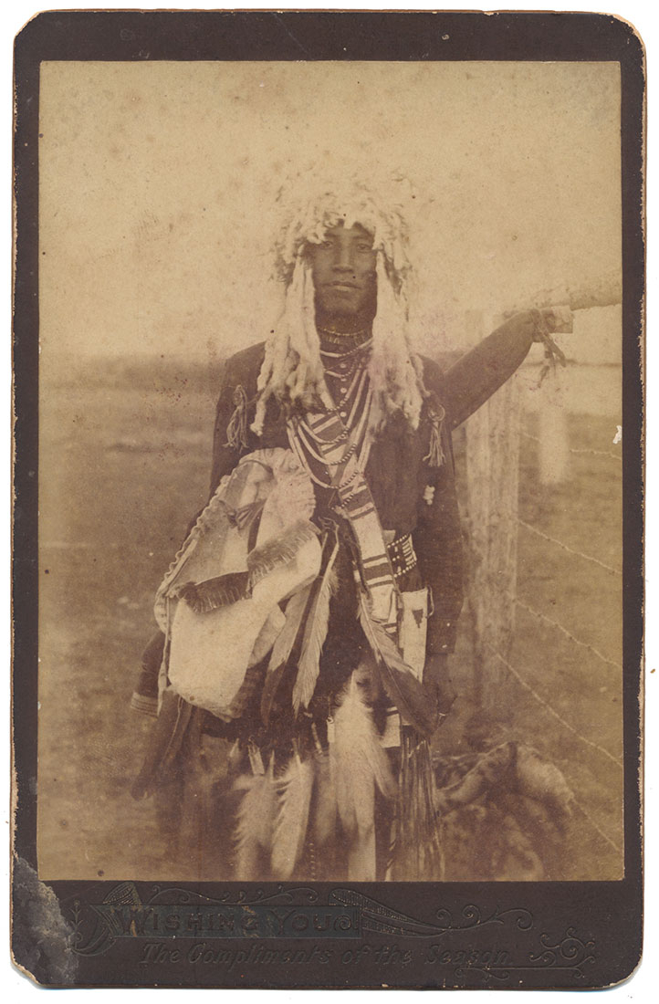 CABINET CARD – NATIVE AMERICAN WITH HEADDRESS, TRIBAL ACESSORIES, AND WAMPUM