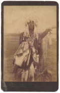 CABINET CARD – NATIVE AMERICAN WITH HEADDRESS, TRIBAL ACESSORIES, AND WAMPUM