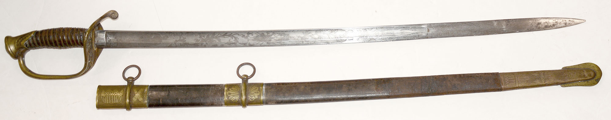 PRESENTATION INSCRIBED FOOT OFFICER’S SWORD AND SCABBARD OF LIEUTENANT AND CAPTAIN EDWARD EVERETT CLAPP, 155th PENNSYLVANIA: WIA FREDERICKSBURG, COMMANDED CO. F AT GETTYSBURG; KIA SPOTTSYLVANIA 