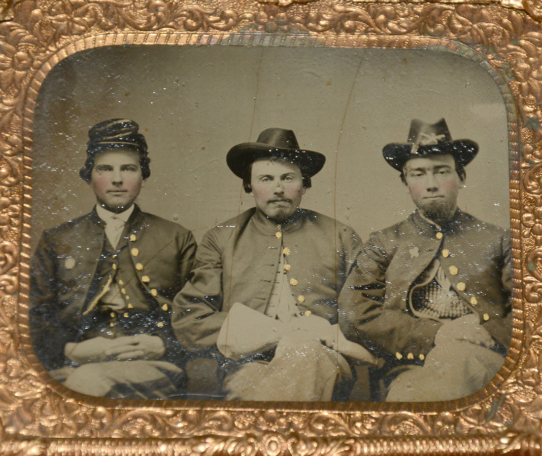 CASED 1/6 PLATE TINTYPE OF THREE UNION MEN – CORPS BADGES