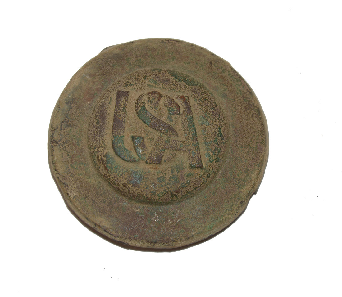 RARE EXCAVATED “USA” HEADSTALL ROSETTE