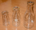 SET OF THREE VINTAGE GETTYSBURG ICE & STORAGE CO. MILK BOTTLES