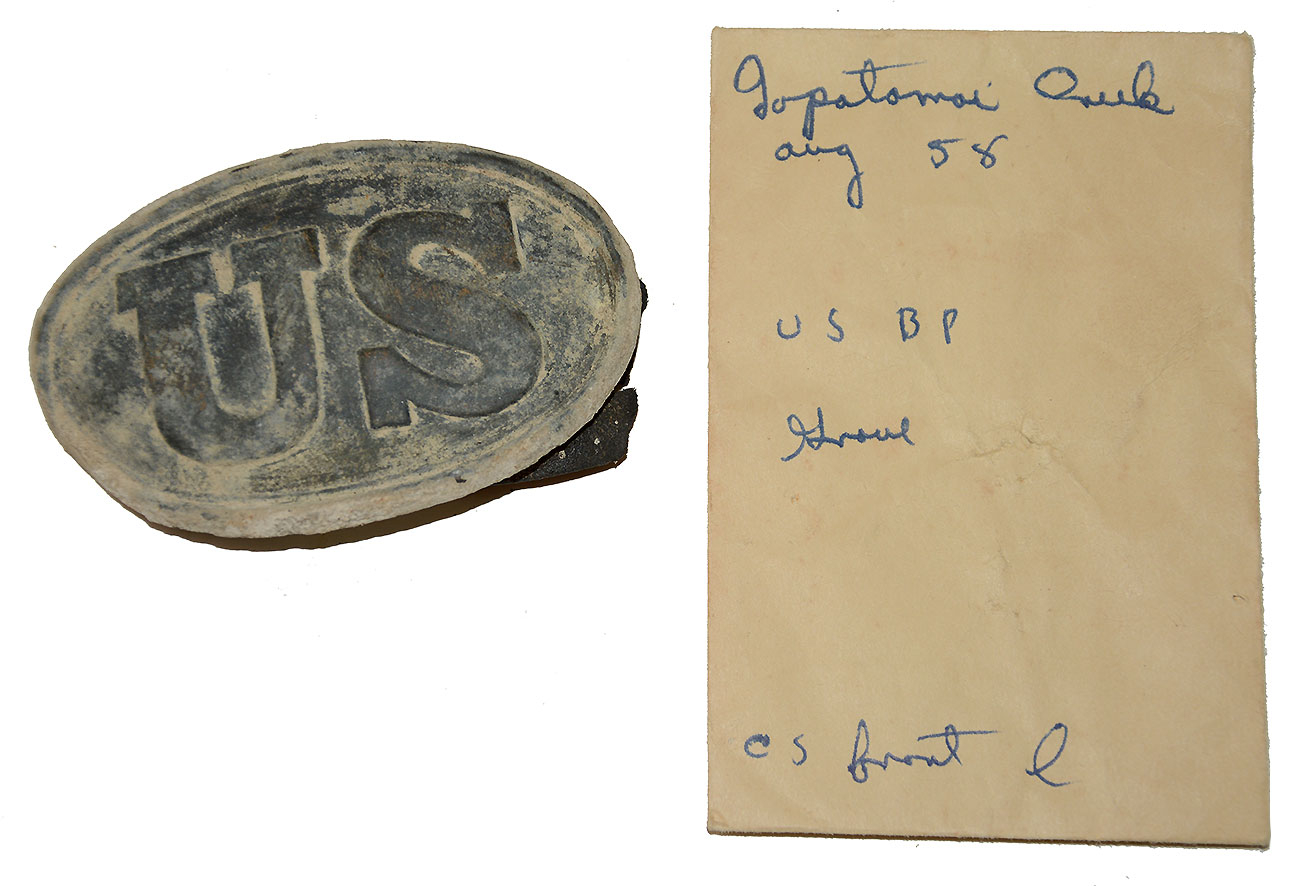 OVAL PUPPY-PAW US BELT PLATE WITH LEATHER RECOVERED IN 1955 BY SYD KERKSIS AT TOTOPOTOMOY CREEK AUGUST 1958