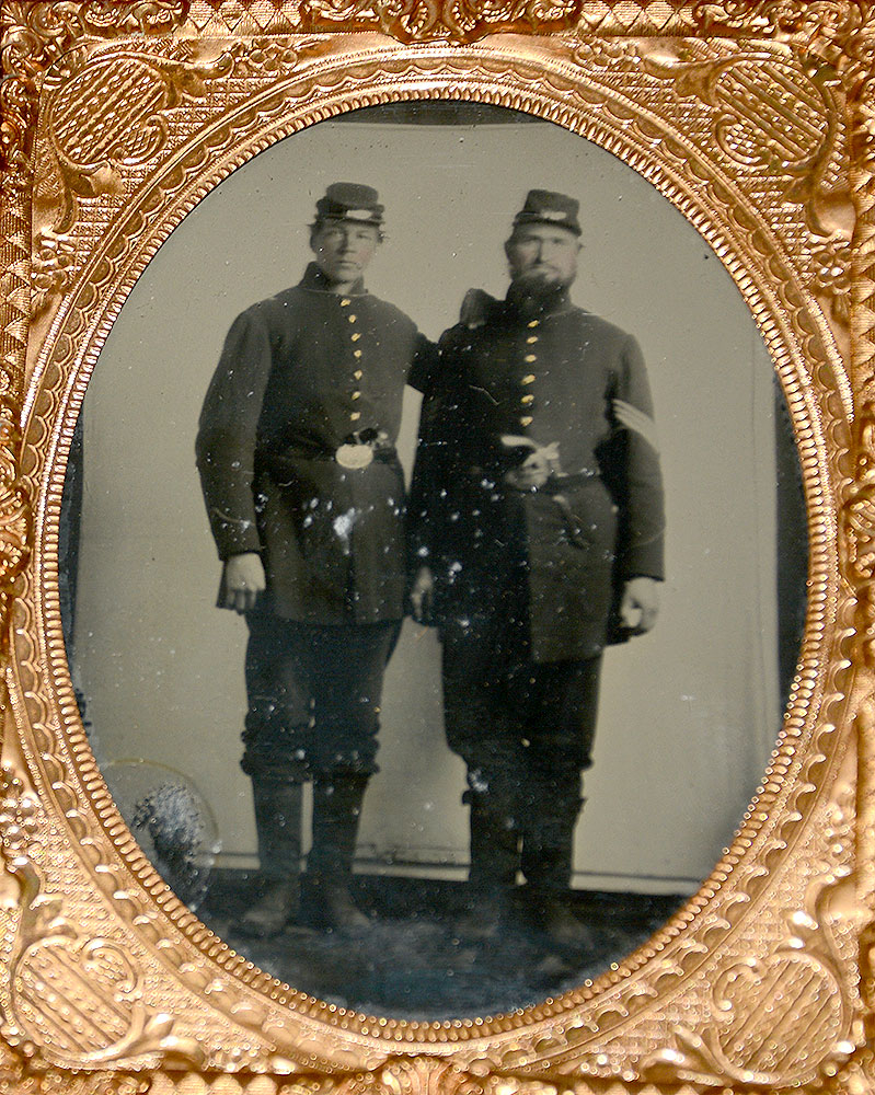 ¼ PLATE AMBROTYPE OF TWO US SOLDIERS WITH REVOLVERS IN BELTS