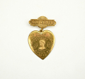 HEART-SHAPED WINNIE DAVIS TWO-PIECE 1912 UCV REUNION BADGE