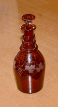 ENGRAVED, RED STAINED CONTINENTAL DECANTER, C. 1840-1850
